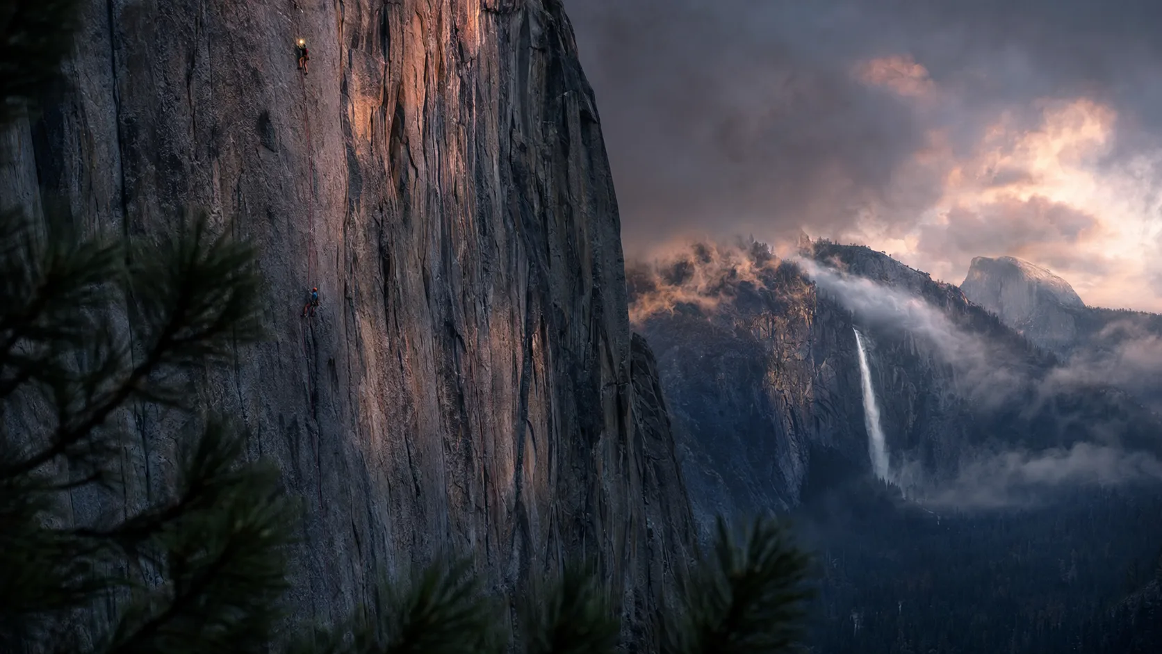 Yosemite National Park's granite cliffs and valley floor at golden hour