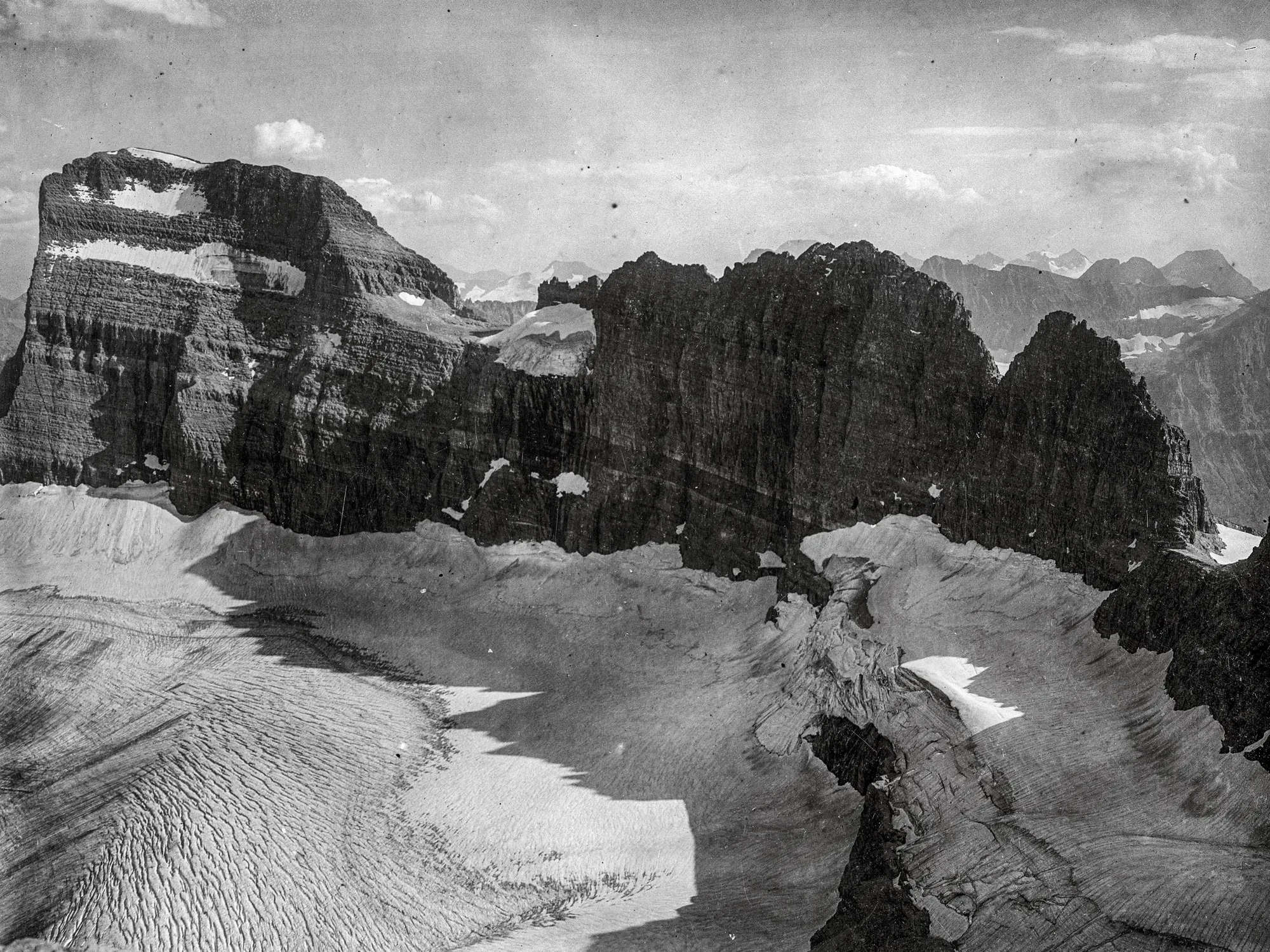 Jagged peaks above a glacial lake, Glacier National Park