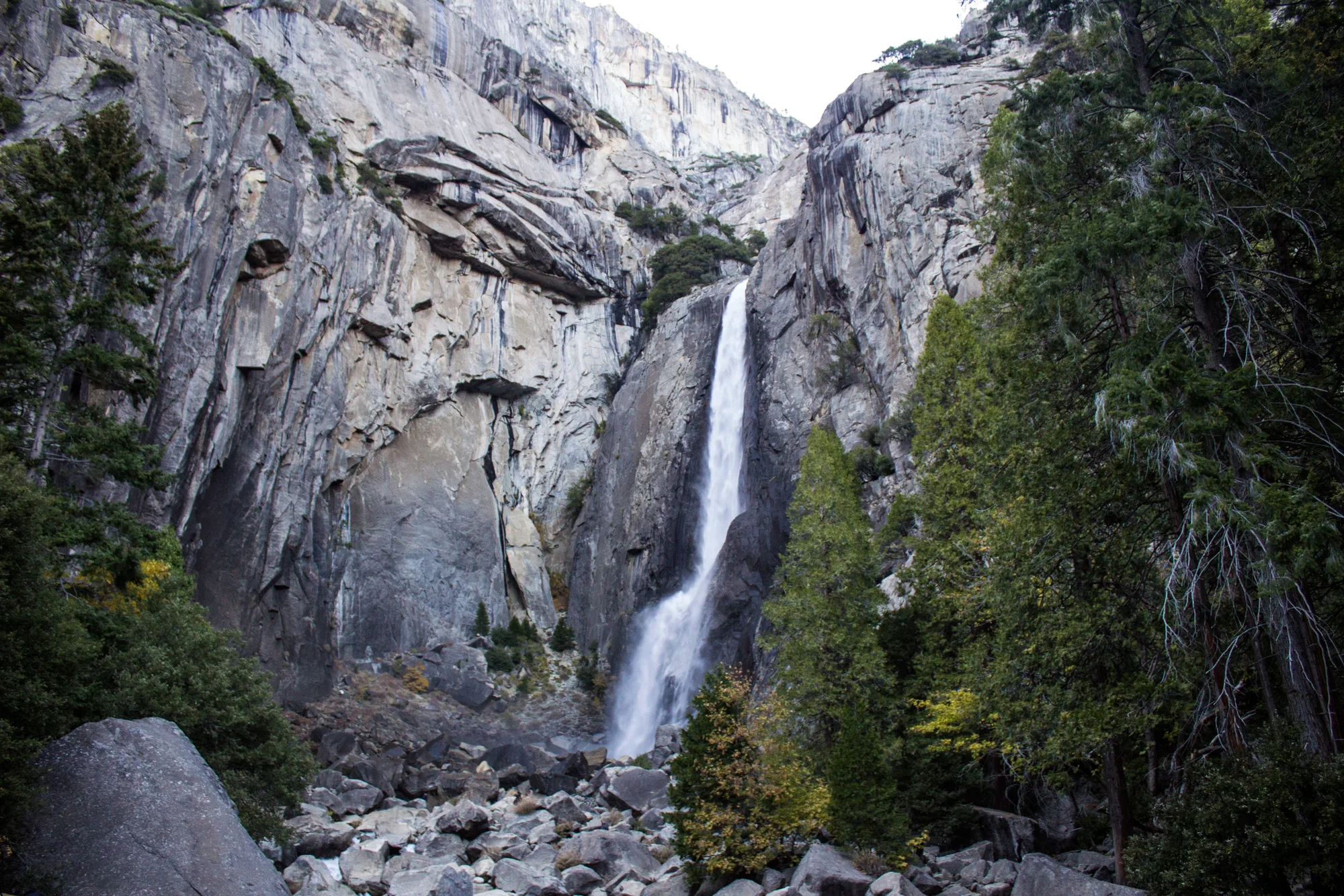 Hikers on granite steps beside Vernal Fall on the Mist Trail, Yosemite National Park